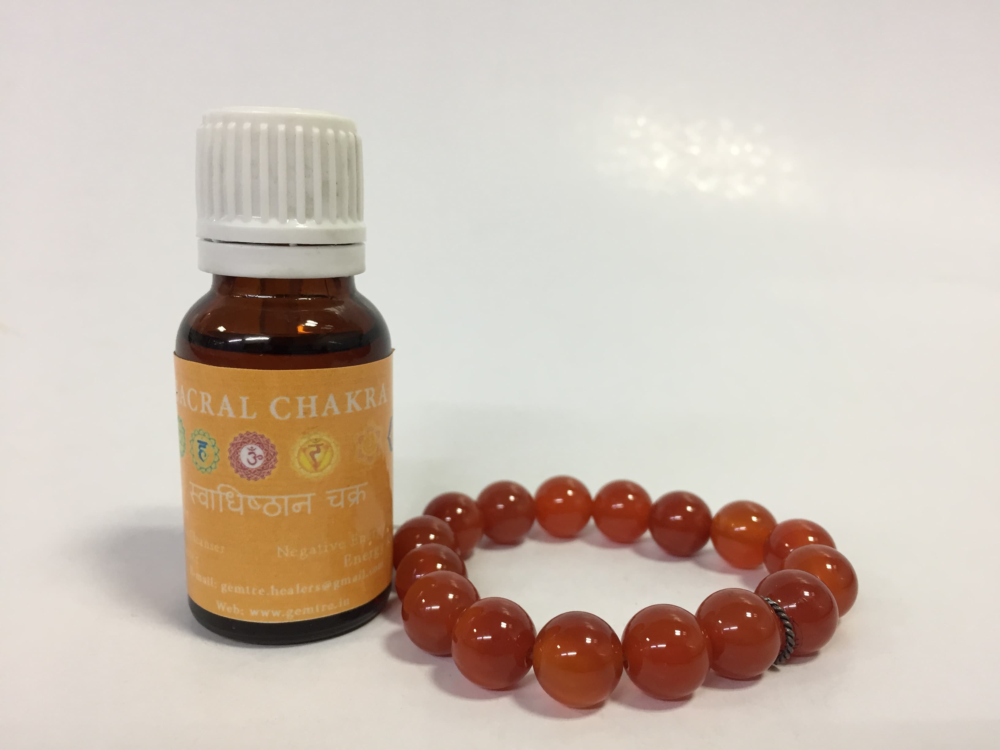 Sacral chakra oil with Carnalien bracelet