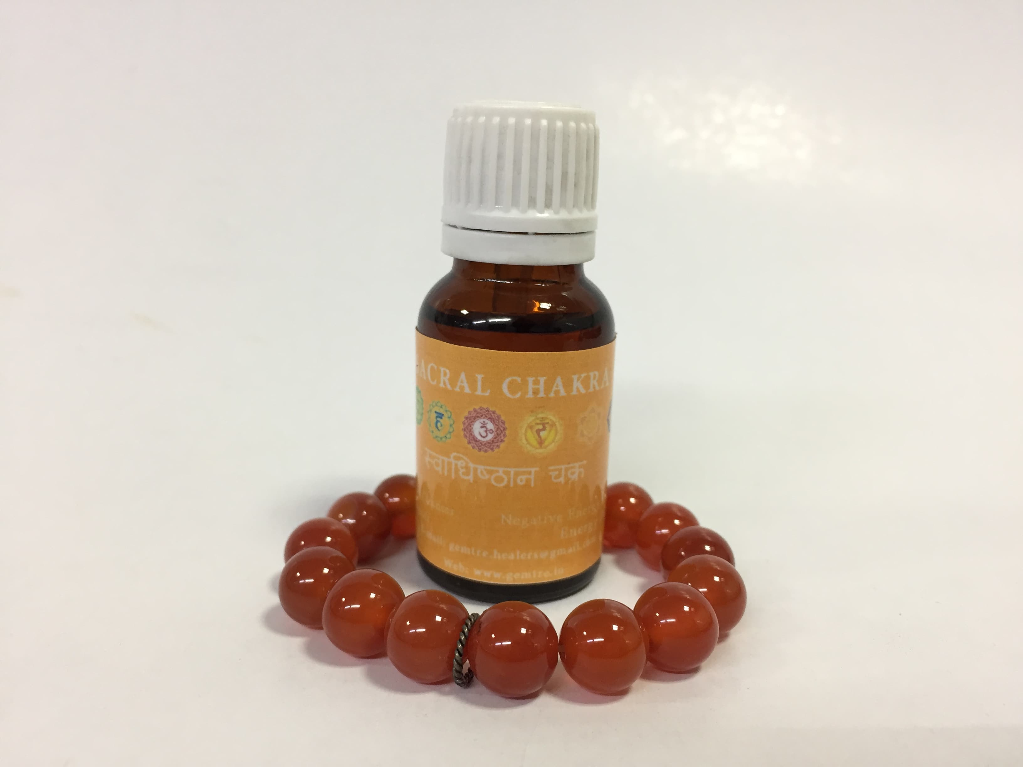 Sacral chakra oil with Carnalien bracelet